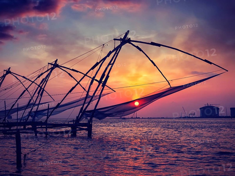 Vintage retro effect filtered hipster style image of Kochi chinese fishnets on sunset. Fort Kochin