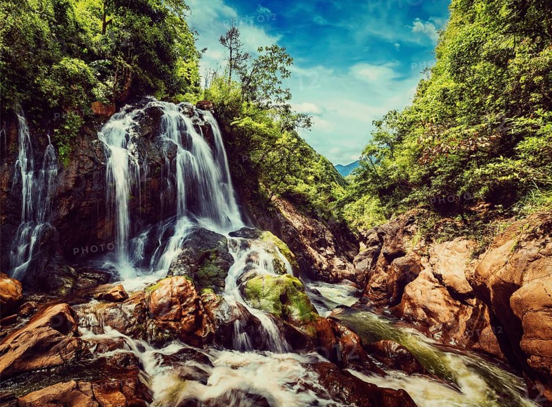 Vintage retro effect filtered hipster style image of Tien Sa Waterfal near Cat Cat Village near