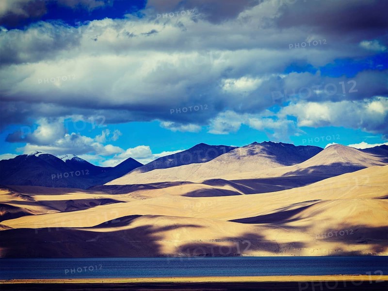 Vintage retro effect filtered hipster style image of Himalayan mountain lake in Himalayas Tso Moriri