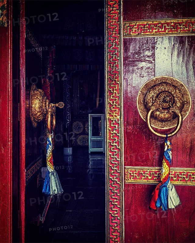 Vintage retro effect filtered hipster style image of open door of Spituk Gompa