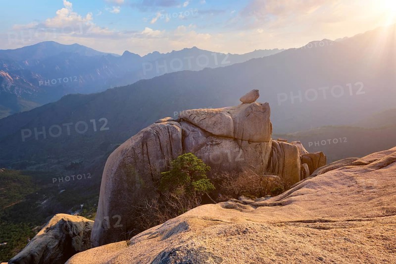 View of stones and rock formations from Ulsanbawi rock peak on sunset. Seoraksan National Park