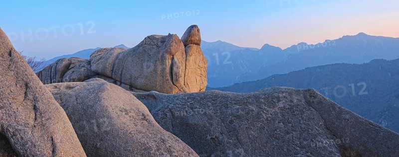 View of stones and rock formations from Ulsanbawi rock peak on sunset. Seoraksan National Park