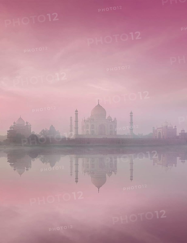 Taj Mahal on sunrise sunset reflection in Yamuna river panorama in fog