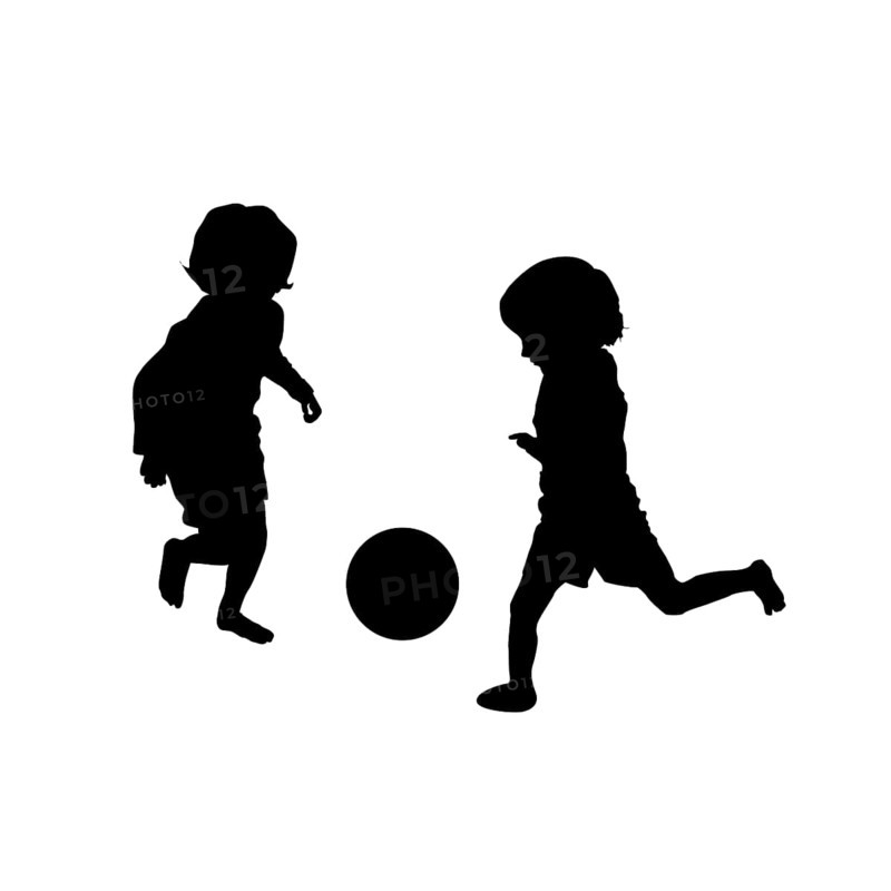 Vector silhouette of children playing soccer