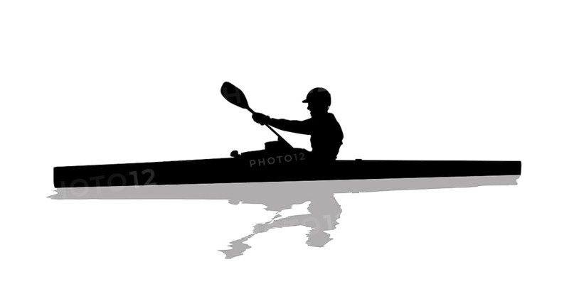 Silhouette of a kayaker on water