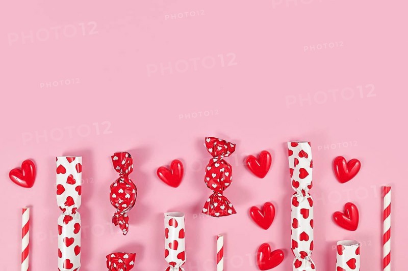 Party flat lay with heart ornaments