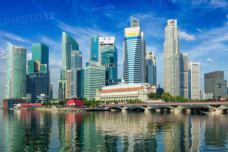 Singapore business district skyscrapers and Marina Bay in day