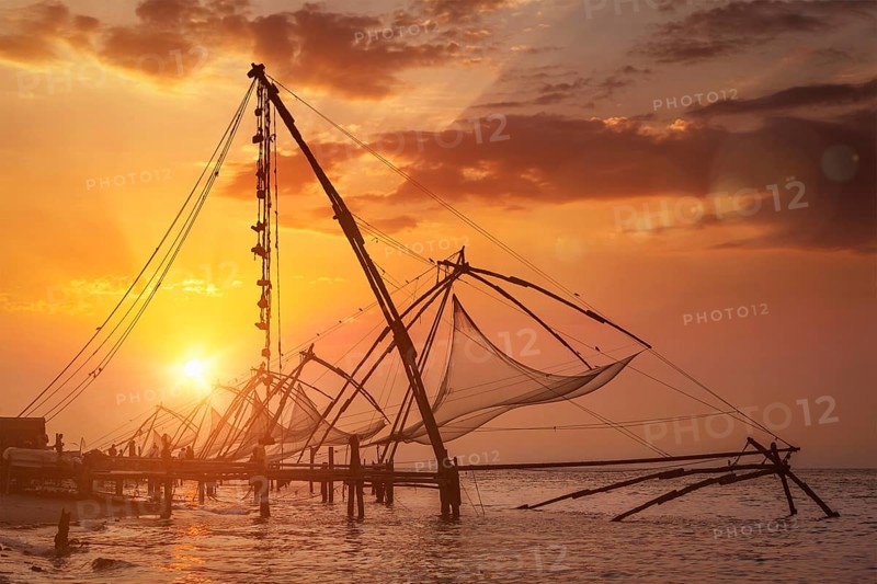 Kochi chinese fishnets on sunset. Fort Kochin