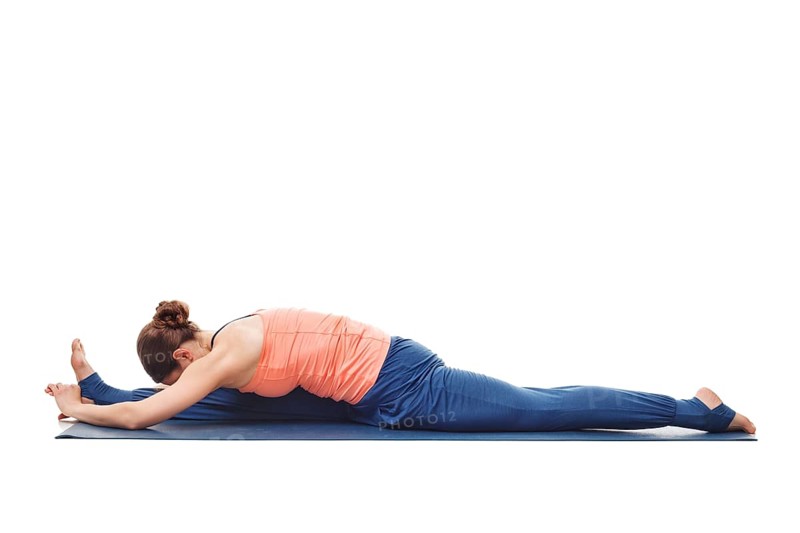 Woman doing Yoga asana Hanumanasana