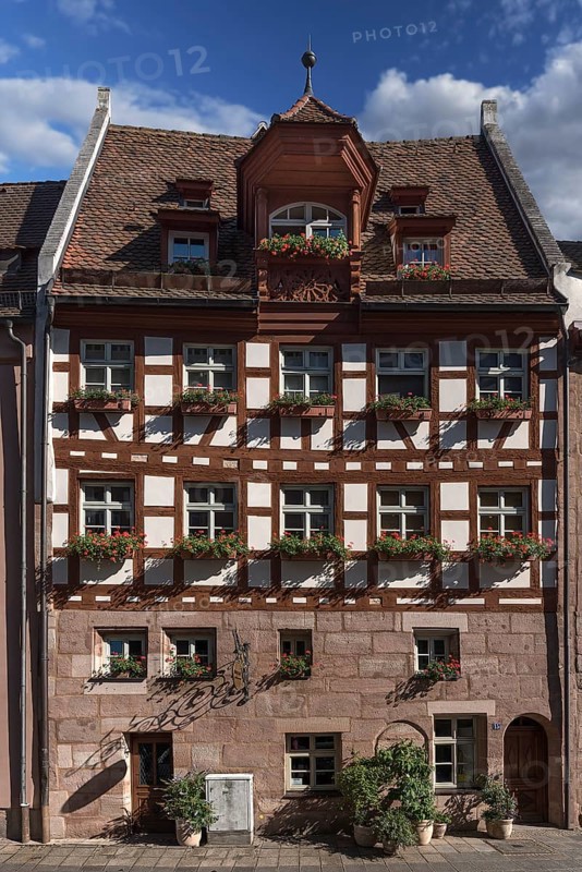 Historic half-timbered house with dormer window