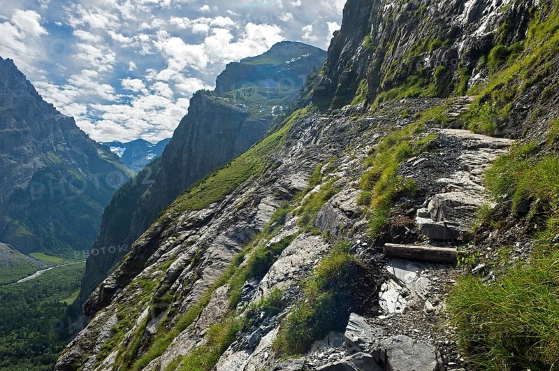 Exposed hiking trail to the Balmhorn Hut above Gasterntal