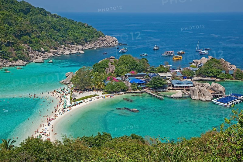 Western tourists sunbathing on the beach of Ko Nang Yuan