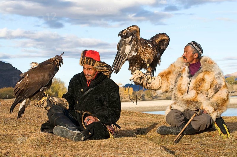 Kazakh hunters with Golden Eagles