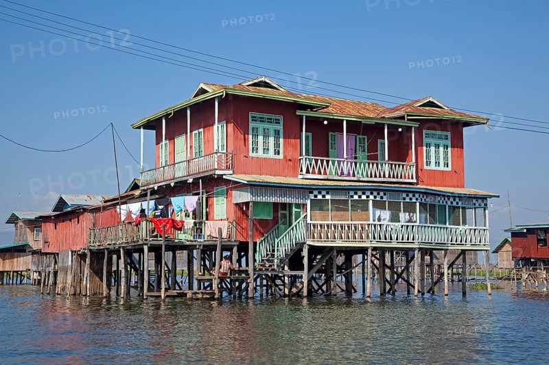 Traditional wooden houses on stilts in Inle Lake