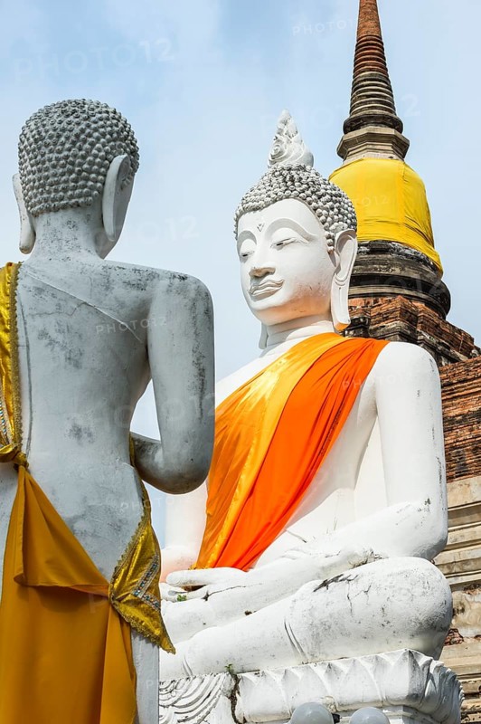 Buddha statues in front of the stupa in Wat Yai Chai Mongkhon