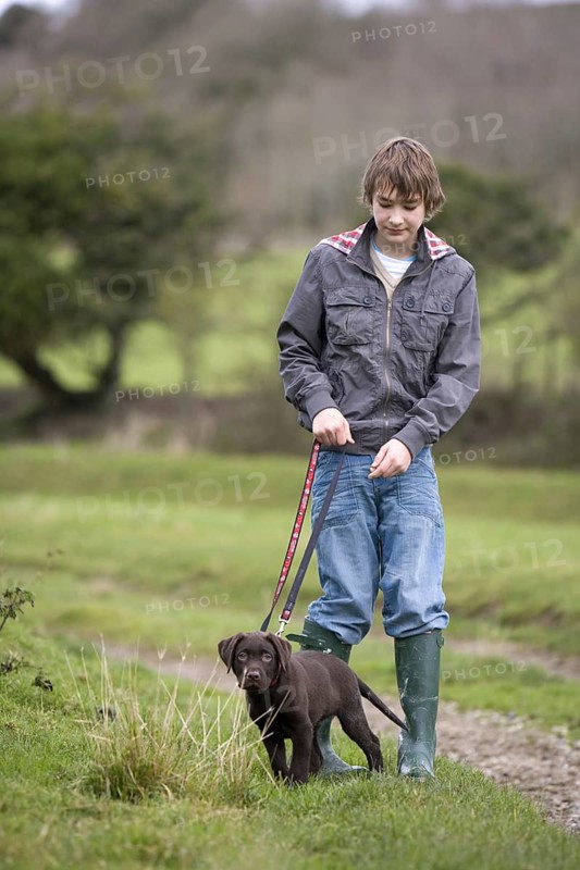 Boy with Labrador Retriever