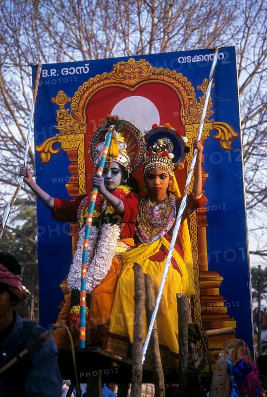 Drama artists in a festival procession dressed like Lord Krishna with His consort Radha in Thrissur Trichur