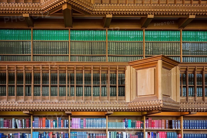 Interior with large bookshelves with book collections in the University Library of Leuven