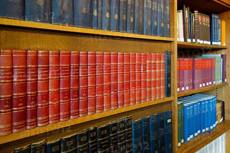 Interior with large bookshelves with book collections in the University Library of Leuven