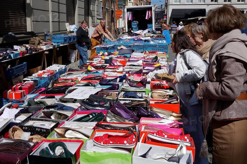 Used shoes for sale at the flea market on St. Jacobs Square in Ghent