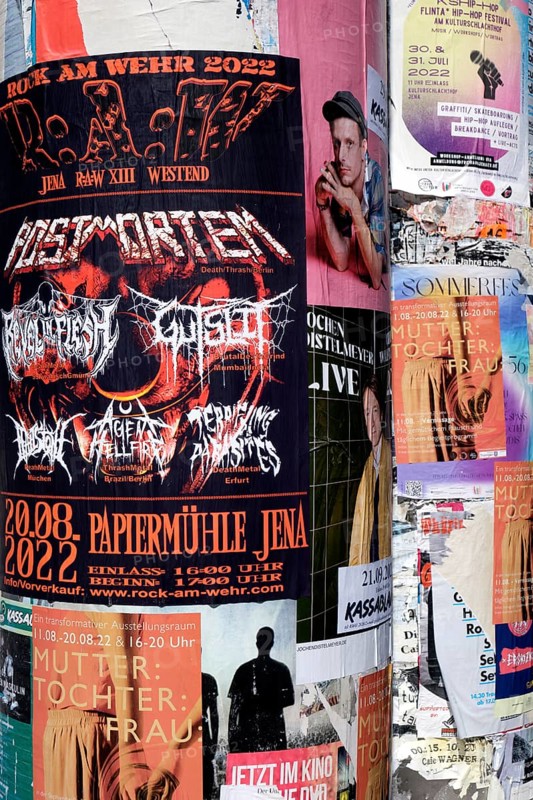 Posters on advertising pillar