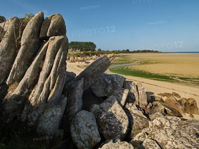 Megaliths at the edge of the intertidal zone on the beach of Guisseny in Brittany
