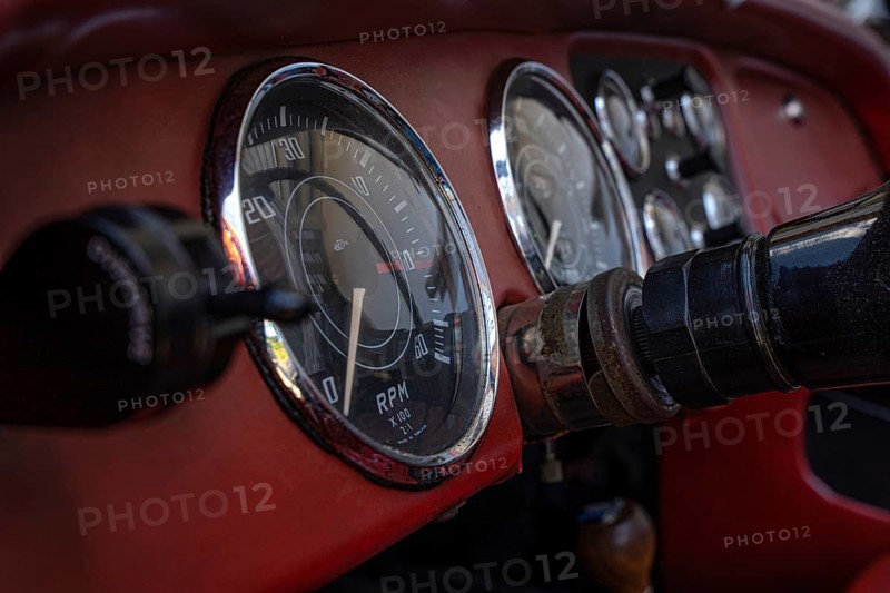 Red speedometer of a classic car