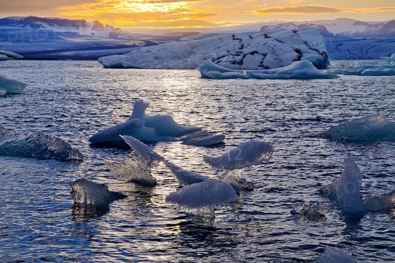 Icebergs in front of setting sun