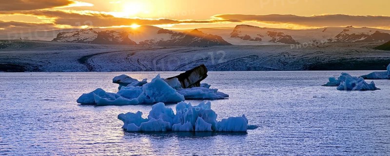 Icebergs in front of setting sun