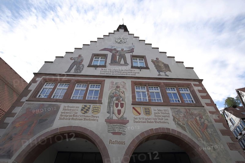 View of the stepped gable of the Renaissance town hall with mural on the market square