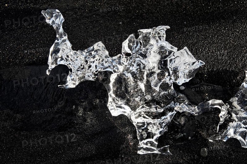 Glacial ice on black beach at Breidarmerkursandur