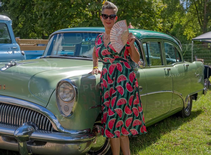 American vintage Buick with a woman