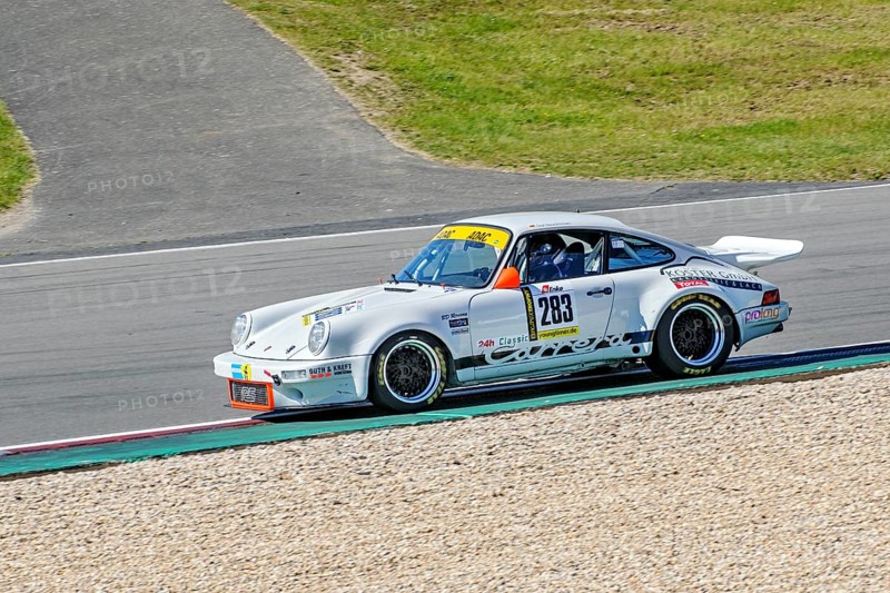 Historic racing car Porsche 911 RS at car racing for classic cars youngtimer classic cars 24-hour race 24h race