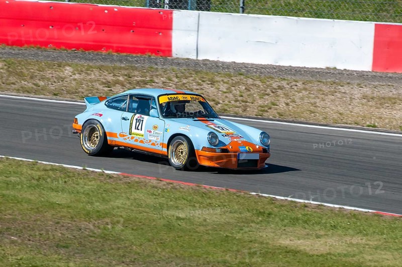 Historic racing car Porsche 911 RSR at car racing for classic cars youngtimer classic cars 24-hour race 24h race