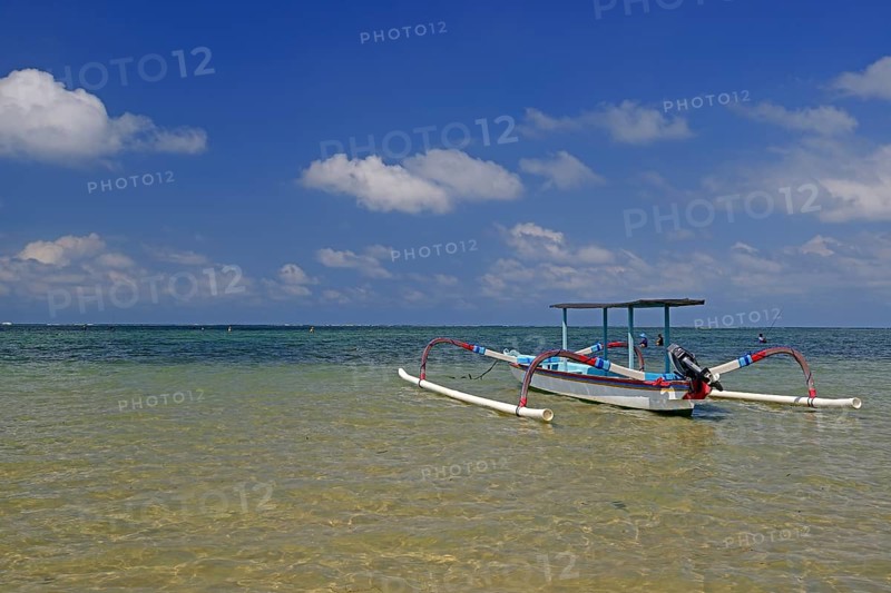 Traditional outrigger boat on the beach of Sanur