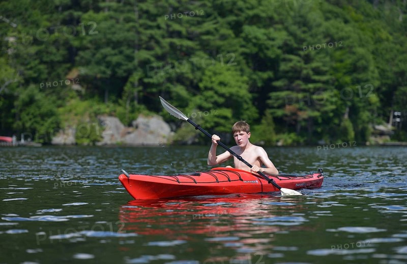 Boy in a canoe