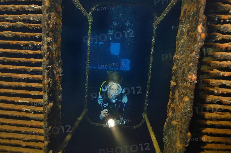Diver penetrates engine room