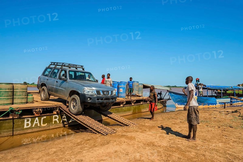 Four-wheel drive car unloading from a ferry