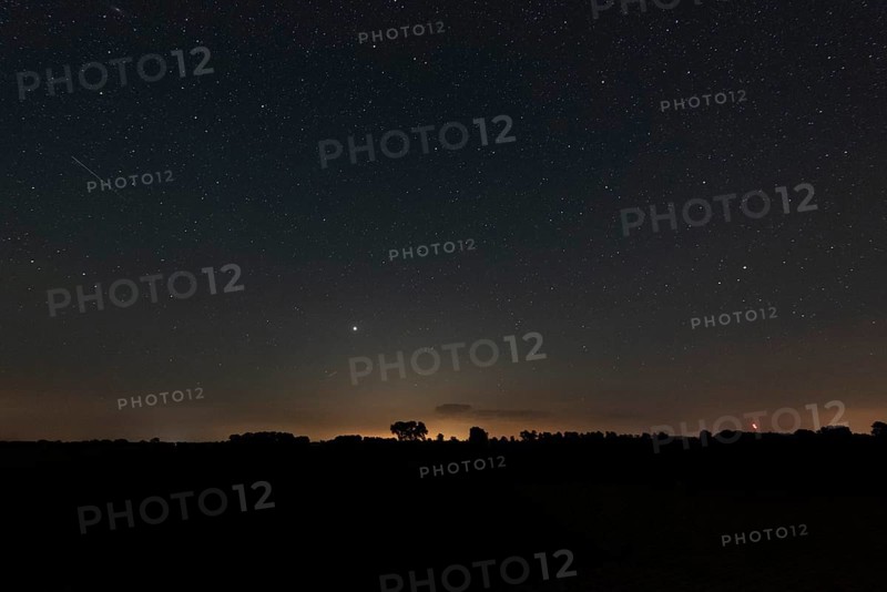 Starry sky with shooting star