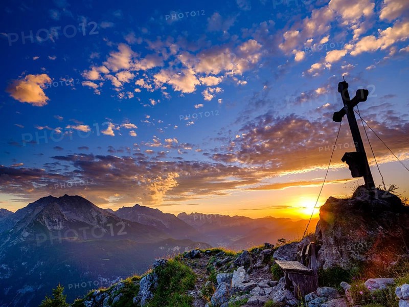 Summit cross of the Brettgabel at sunset
