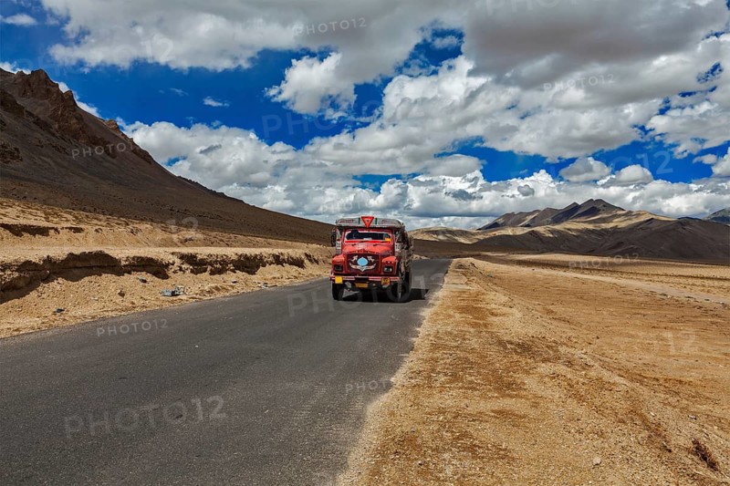 Manali-Leh road in Indian Himalayas with lorry. More plains