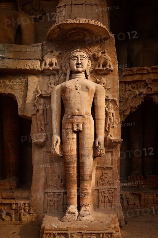 Rockcut Statue of Jain thirthankara in rock niches near Gwalior fort. Gwalior