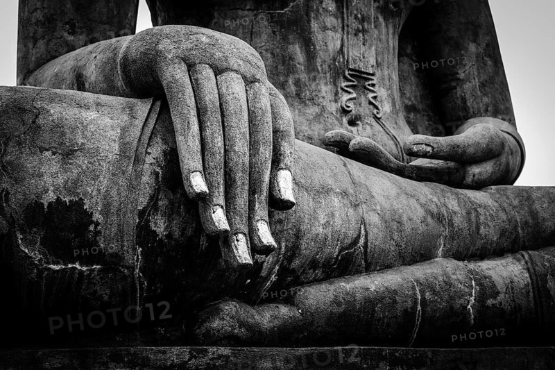 Buddha statue hand close up detail. Sukhothai