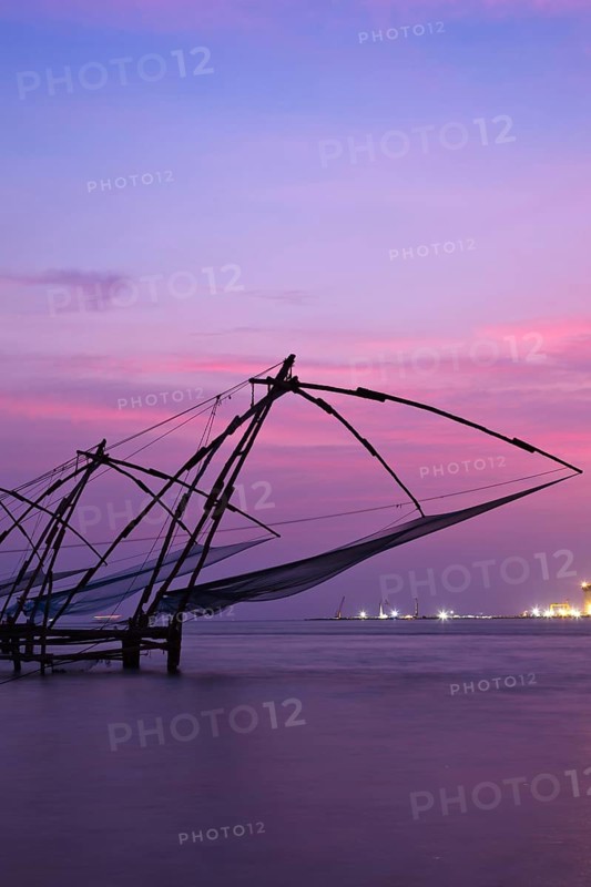 Kochi chinese fishnets on sunset. Fort Kochin