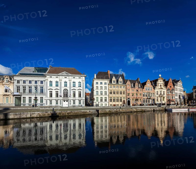 Travel Belgium medieval european city town background with canal. Koperlei street