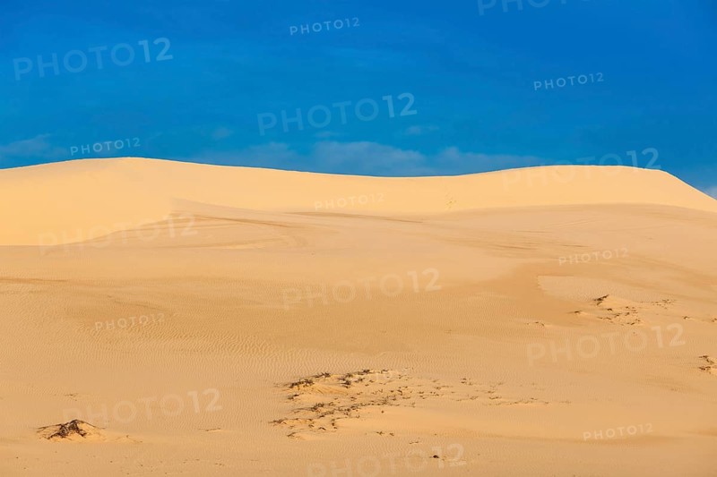 White sand dunes on sunrise