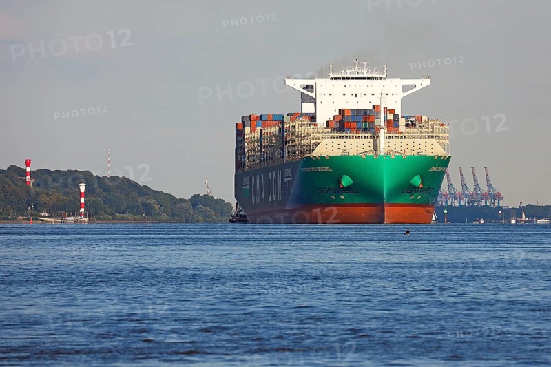 Container ship CMA CGM TROCADERO powered by liquefied natural gas LNG leaves the port of Hamburg on the river Elbe