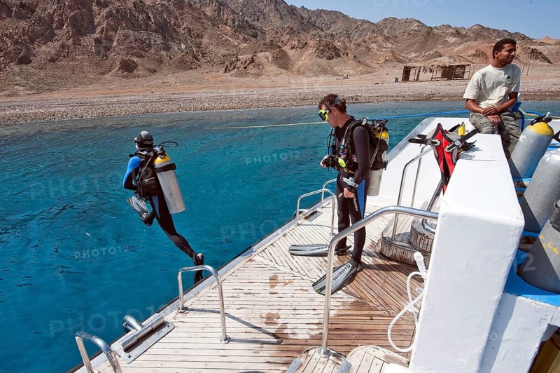 Diver jumps from diving platform