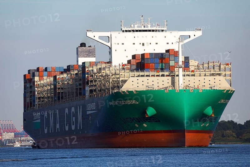 Container ship CMA CGM TROCADERO powered by liquefied natural gas LNG leaves the port of Hamburg on the river Elbe