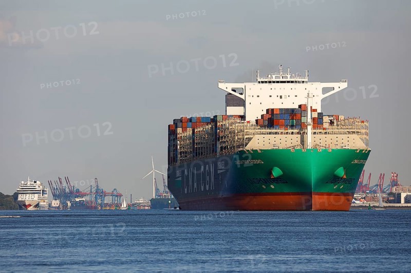 Container ship CMA CGM TROCADERO powered by liquefied natural gas LNG leaves the port of Hamburg on the river Elbe
